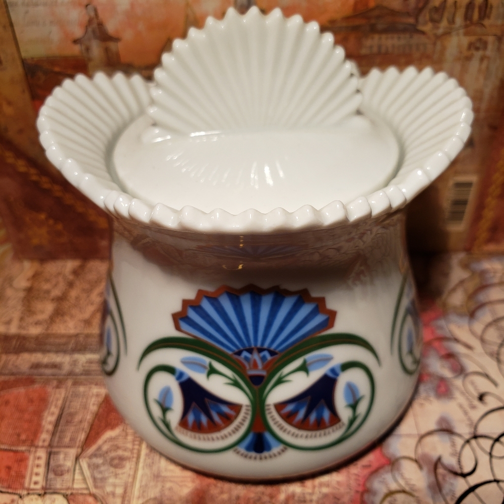 Treasures of the Pharaohs porcelain jar with lid.